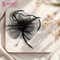 Majestique Elegant Fascinator Hat with Mesh Veil and Feather - Black